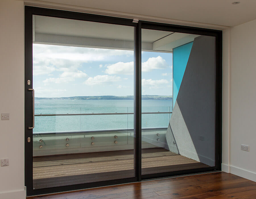 Grey aluminium sliding patio door