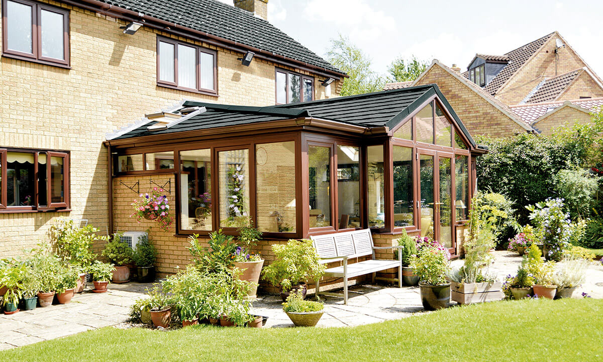 Bespoke P-Shaped conservatory with a tiled roof