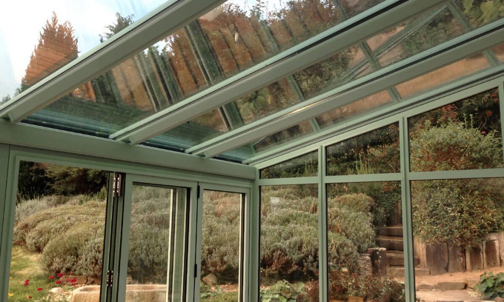 Chartwell green conservatory with a glass roof