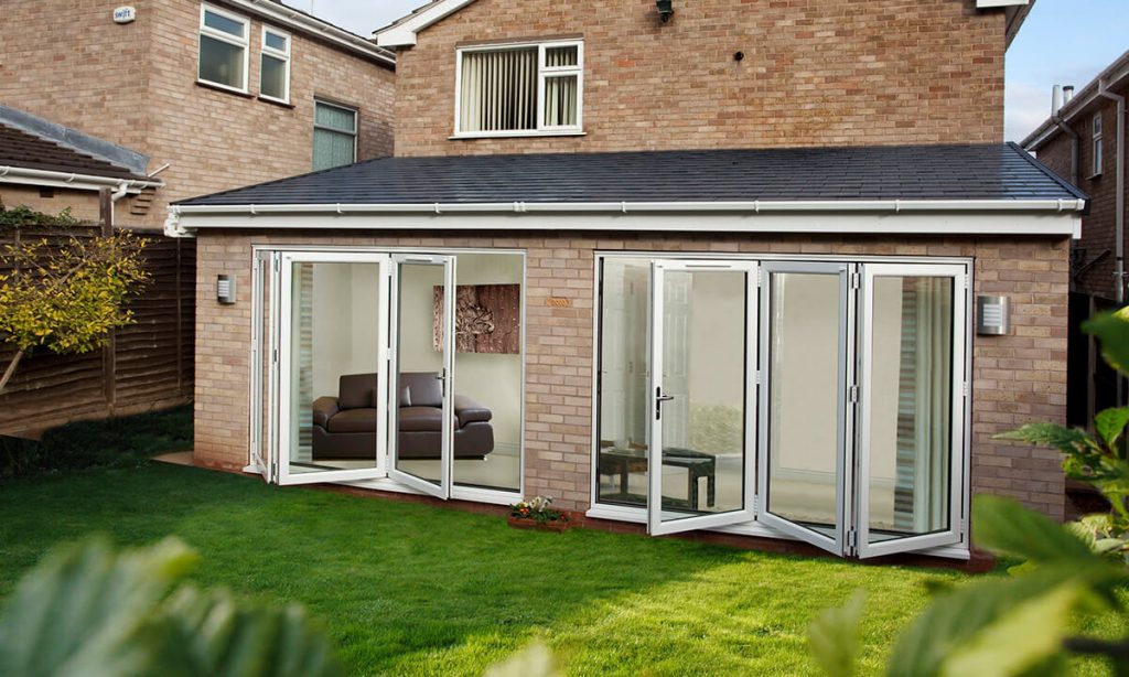 Open white uPVC bifold doors