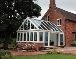 White uPVC gable conservatory with a glass roof