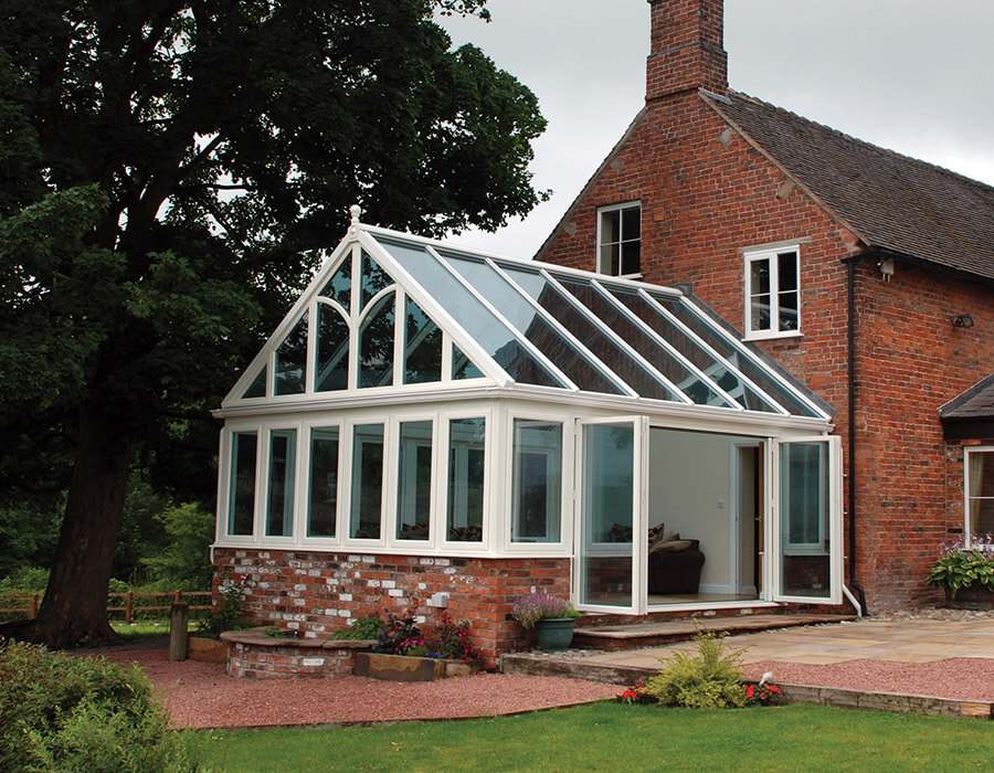 White uPVC gable conservatory with a glass roof