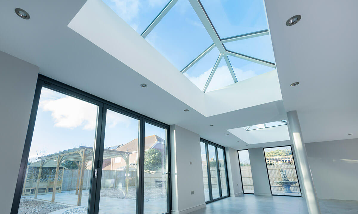 Large white uPVC lantern roof interior view