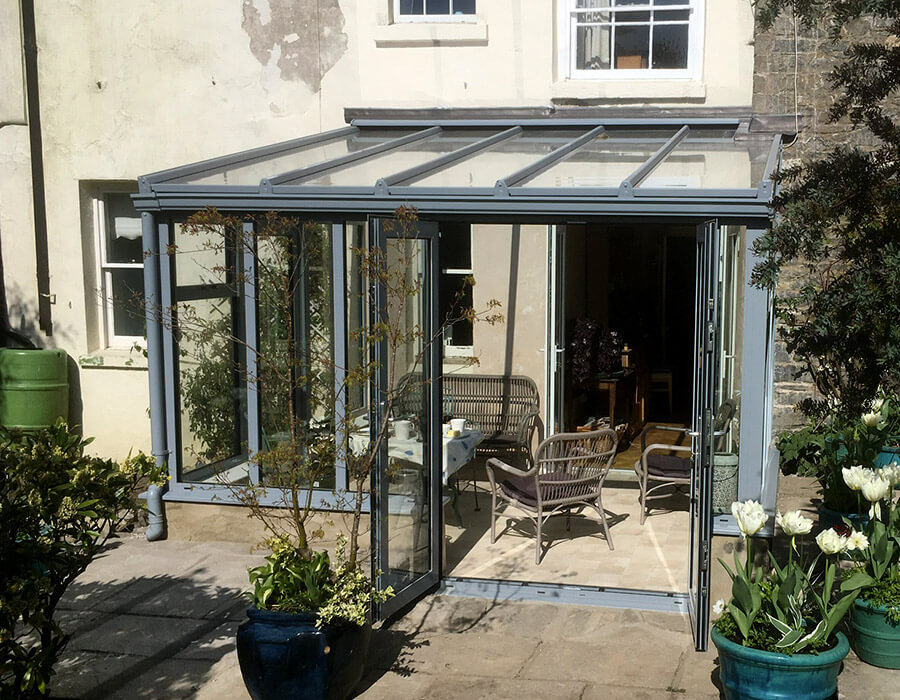 Grey uPVC lean to conservatory exterior