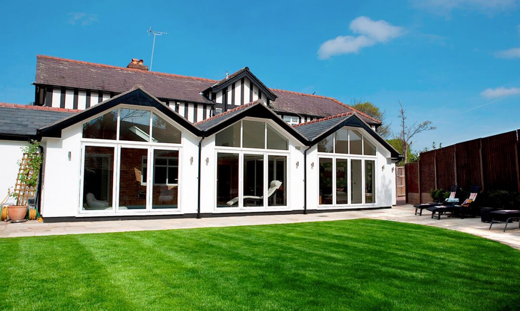 Multiple white uPVC bifold doors