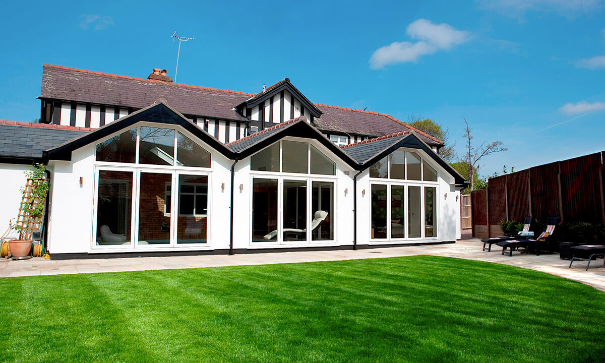 Multiple white uPVC bifold doors