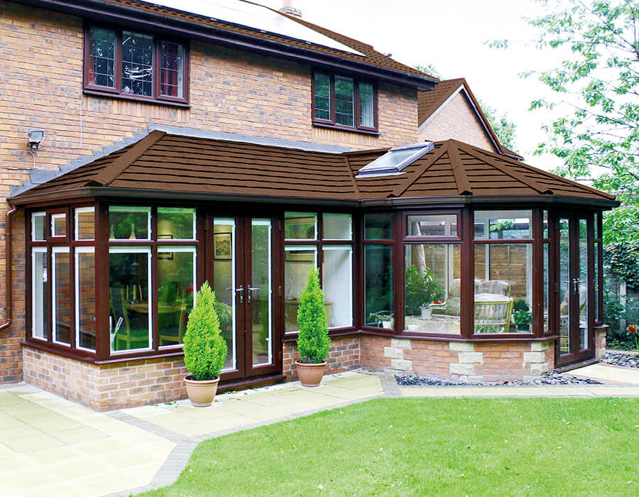 Rosewood effect P-Shaped conservatory with a tiled roof