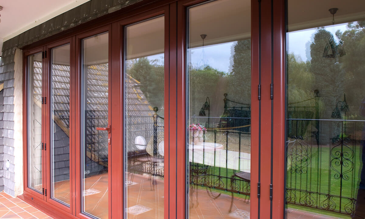 Red aluminium bifold door