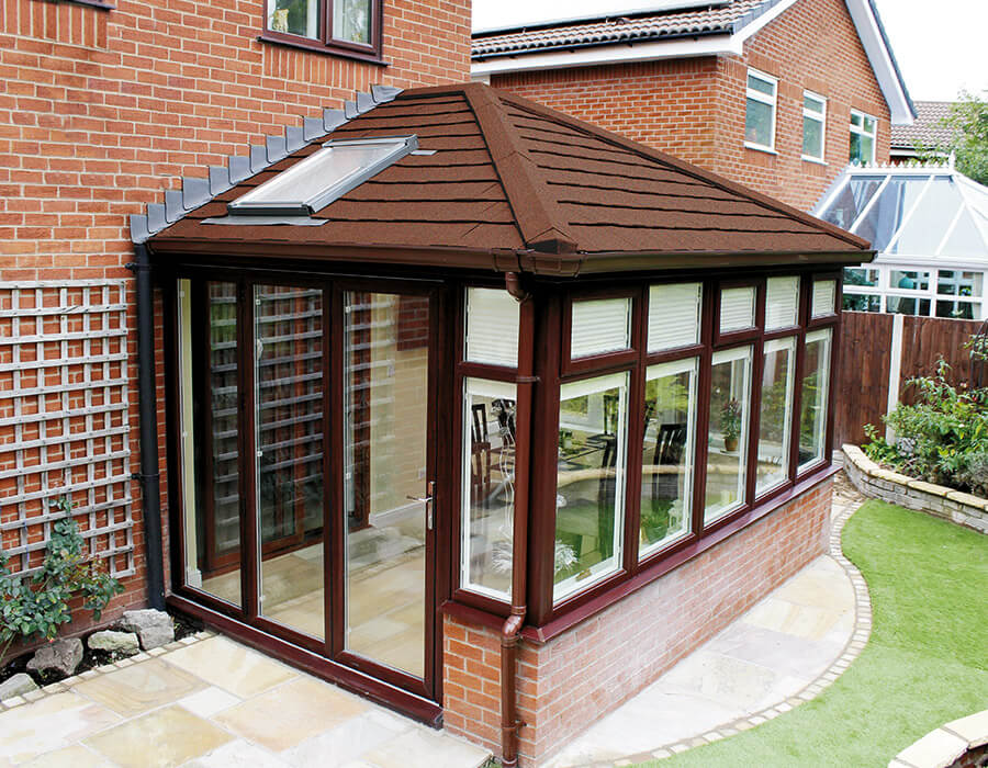 Rosewood uPVC edwardian conservatory with a tiled roof