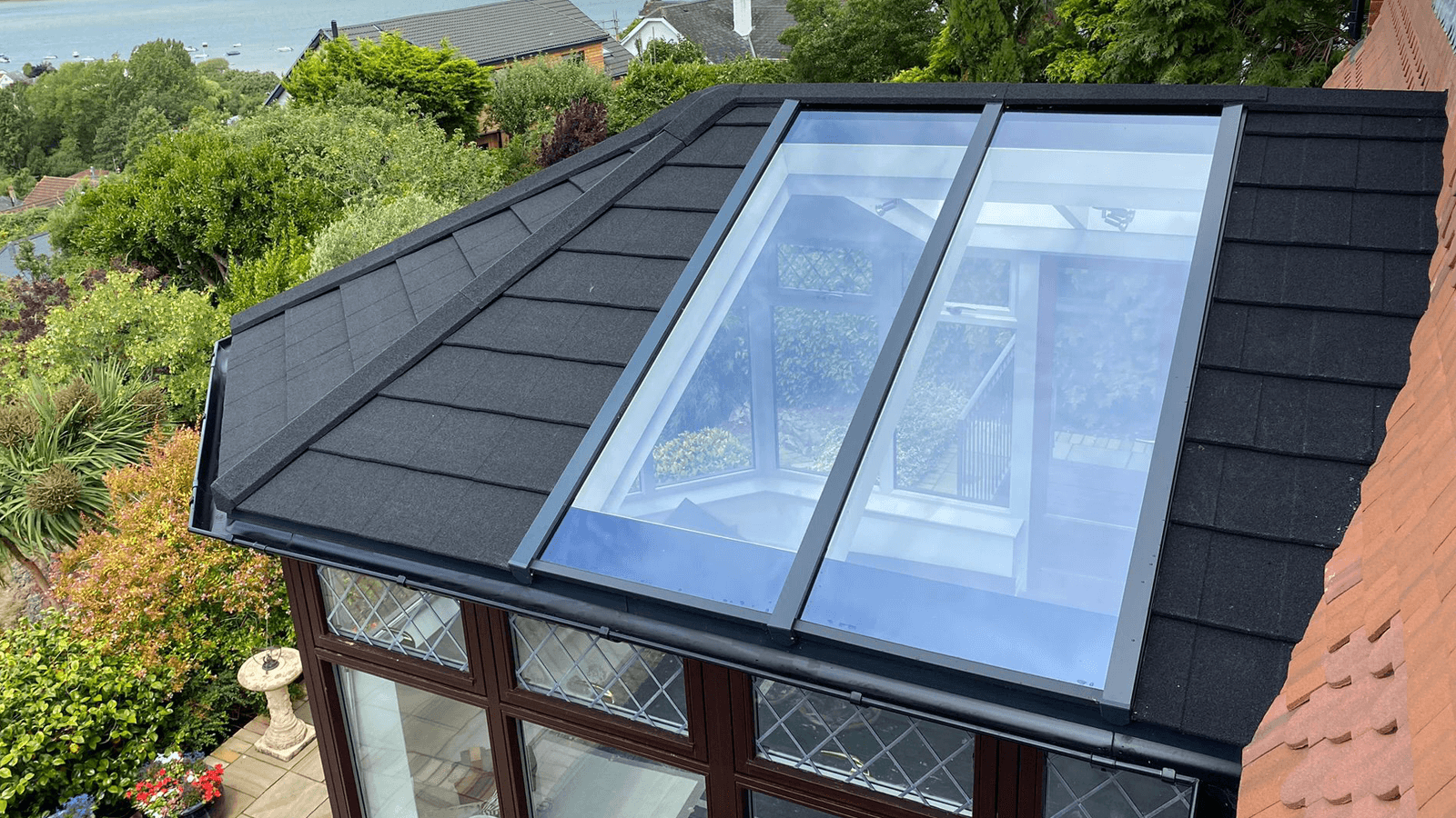 tiled roof of a conservatory with a rooflight